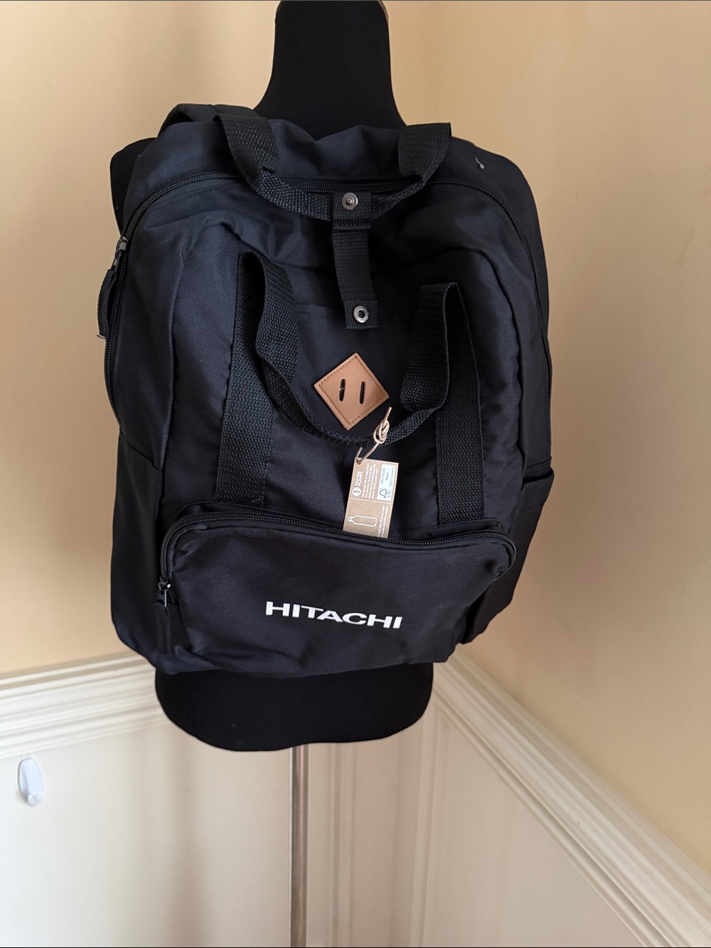 Hitachi Black Backpack with‎ Tan Accent and White Logo